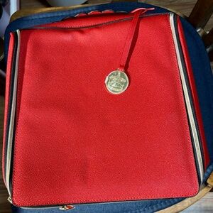 Red Eestee Lauder cosmetic bag